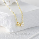 Introducing the exquisite Lana ADA Necklace by Sodashi. This beautiful piece features a double heart smooth and cubic zirconia charm design, elegantly paired with a thin chain. Available in both gold and silver plating, the necklace is crafted from high-quality sterling silver. With a chain length of 45CM, it is the perfect accessory to add a touch of sophistication and charm to any outfit. Discover the elegance of the Lana ADA Necklace and make it a cherished addition to your jewelry collection.