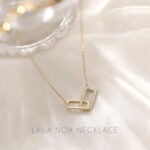 Introducing the Lana Noa Necklace by Sodashi, a timeless piece that captures elegance and sophistication. Featuring a unique design with a rectangle plain sterling silver pendant linked to a cubic zirconia studded rectangle pendant, this necklace is perfect for adding a touch of glamour to any outfit. Available in both silver and gold plated finishes, it offers versatility to match any style. Crafted from high-quality sterling silver, the 45CM chain ensures a comfortable fit. The Lana Noa Necklace is a stunning accessory that enhances your look with its refined beauty and exquisite detail. Discover this exquisite piece at Sodashi today.